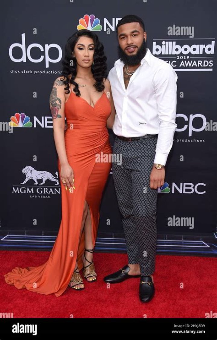 Queen Naija and Clarence White as seen in June 2018